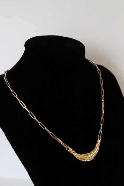 COLLIER en or jaune (750) à maille cheval...
