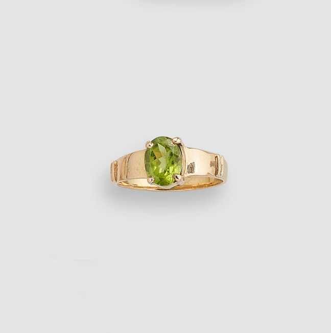 BAGUE en or (750) à large anneau sertie d'un...