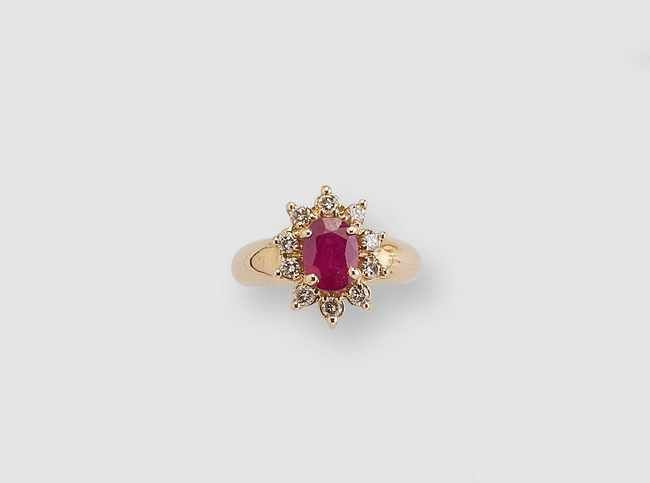 BAGUE marguerite en or (750) avec rubis taille...