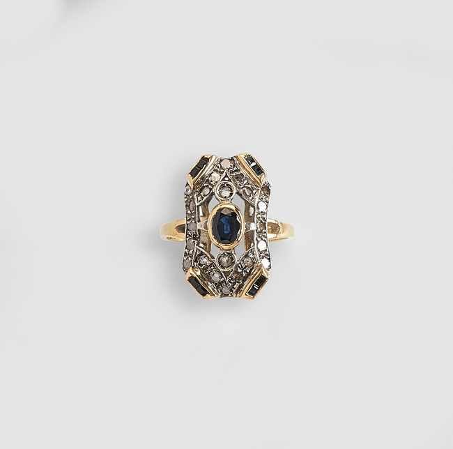 BAGUE en or jaune et gris (750) à châton...