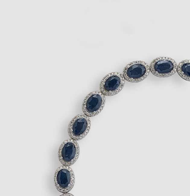 BRACELET en argent (925) à dix maillons ovales...