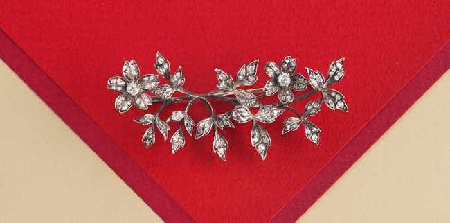 BROCHE feuillage en argent (800) et or (750)...