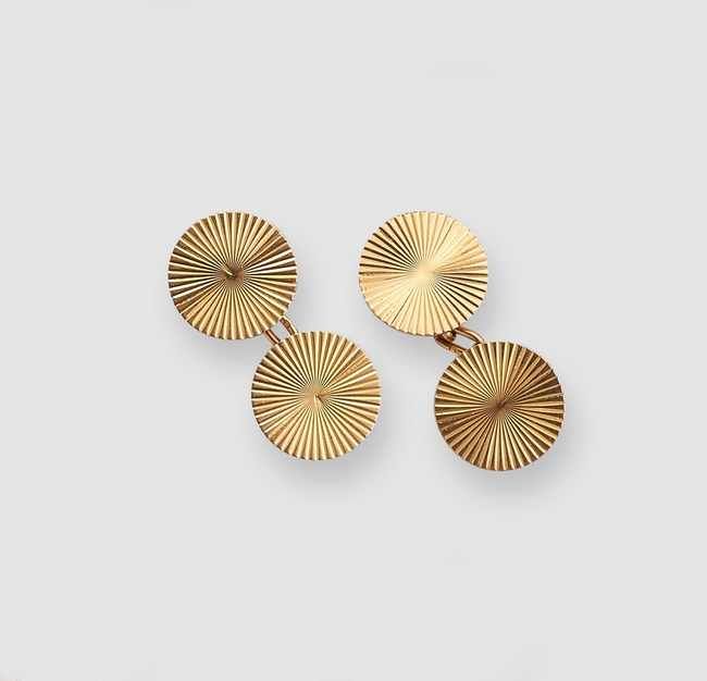 PAIRE DE BOUTONS DE MANCHETTES en or jaune...