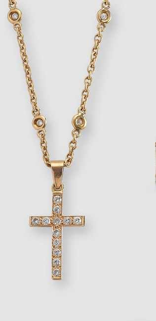 CHAÎNE en or (750) avec huit petits diamants...