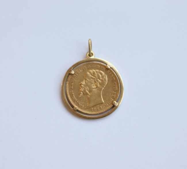 PENDENTIF en or (750) retenant une pièce...