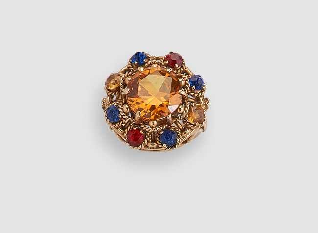 BAGUE FLEUR en or jaune (750) tressé et ajouré...