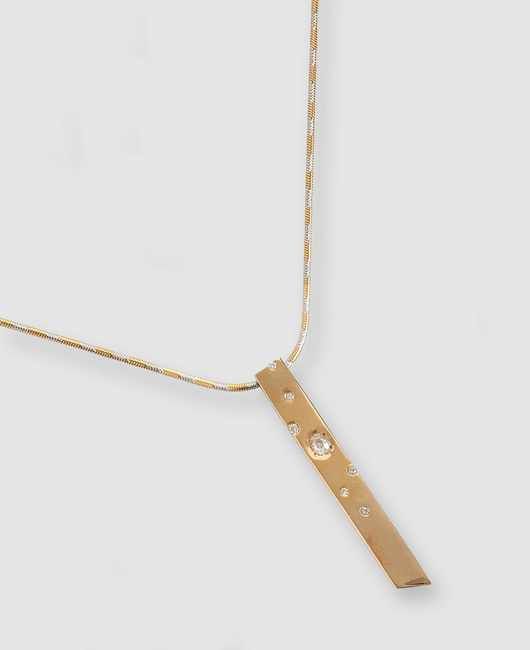 PENDENTIF barette en or jaune (750) orné...