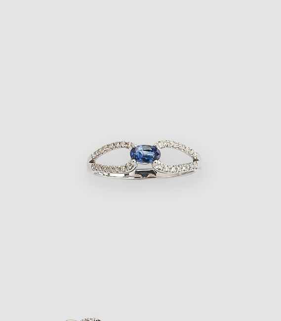 BAGUE en or gris (375) sertie d'un petit...