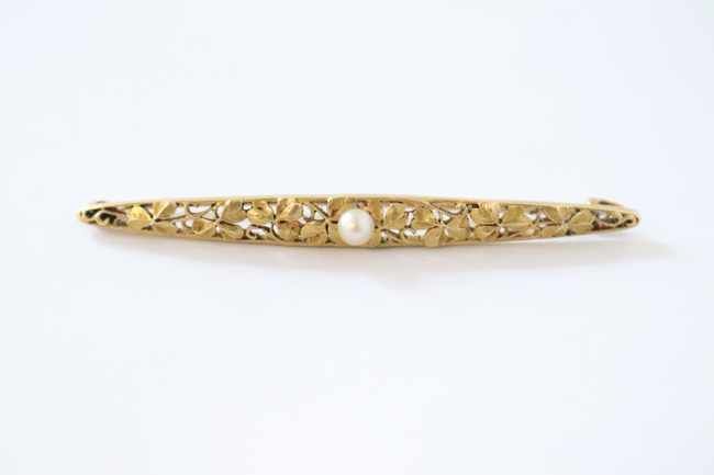 BROCHE BARRETTE en or jaune (750) sertie...