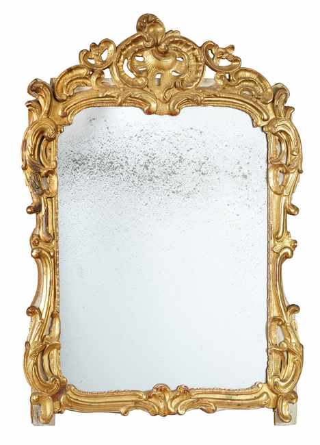 MIROIR au mercure dans un cadre en bois sculpté...