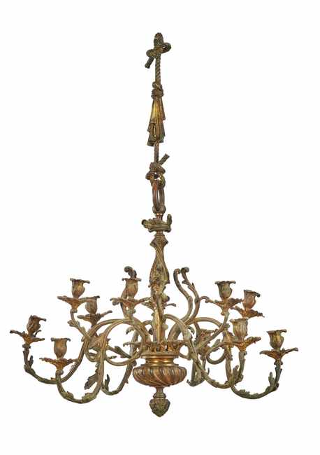 LUSTRE en bronze à douze bras de lumière...