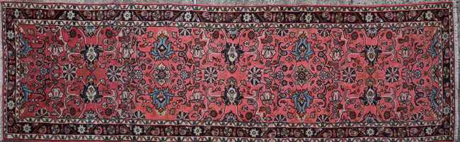 TAPIS GALERIE en laine à décor de fleurs...