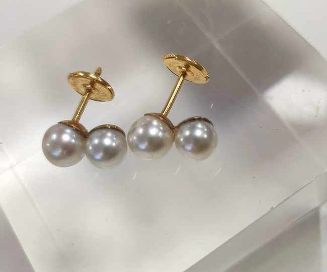 PAIRE DE BOUTONS D’OREILLES en or jaune (750)...