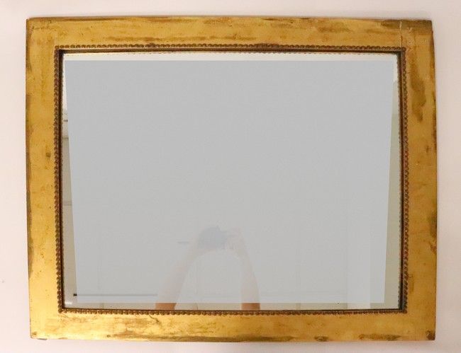 MIROIR rectangulaire en bois doré mouluré...