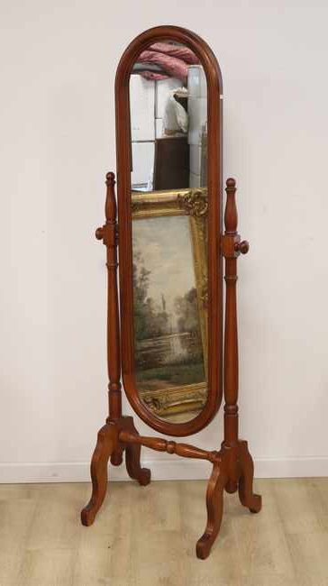 MIROIR PSYCHÉ en bois teinté, à glace ovale...