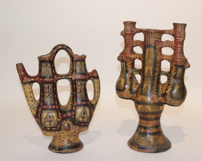 DEUX ORIGINALES VERSEUSES en céramique à...