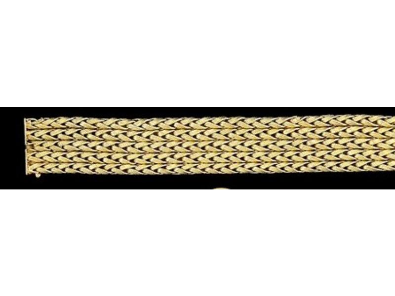 BRACELET tressé en or jaune. Larg. 2 cm Poids...