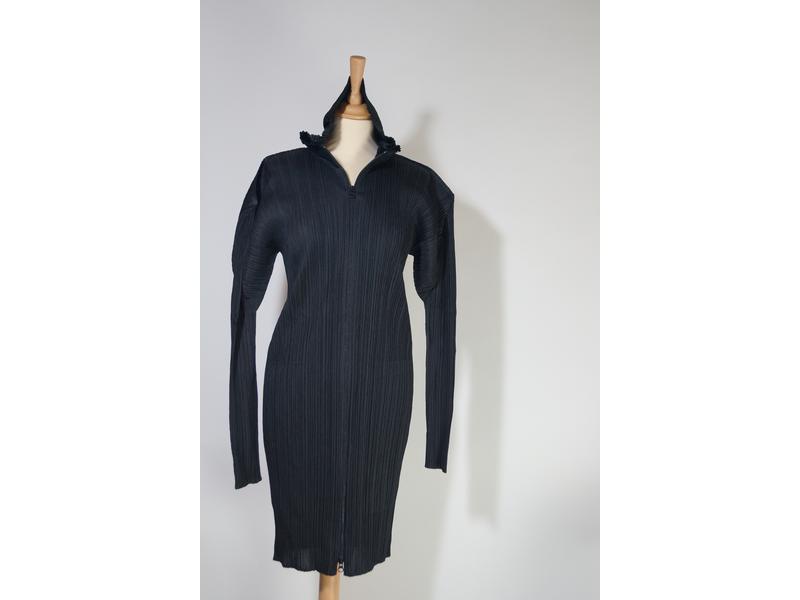 PLEATS PLEASE
