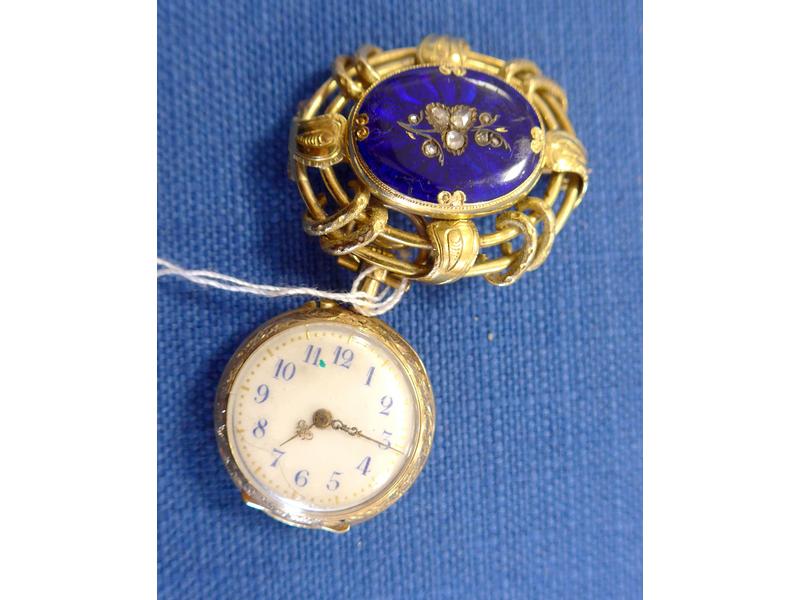 BROCHE ET SA MONTRE DE COL en or jaune à...