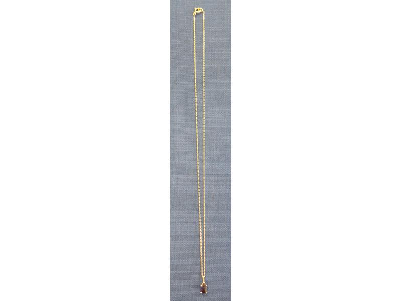 PENDENTIF en or gris serti d'un saphir taille...