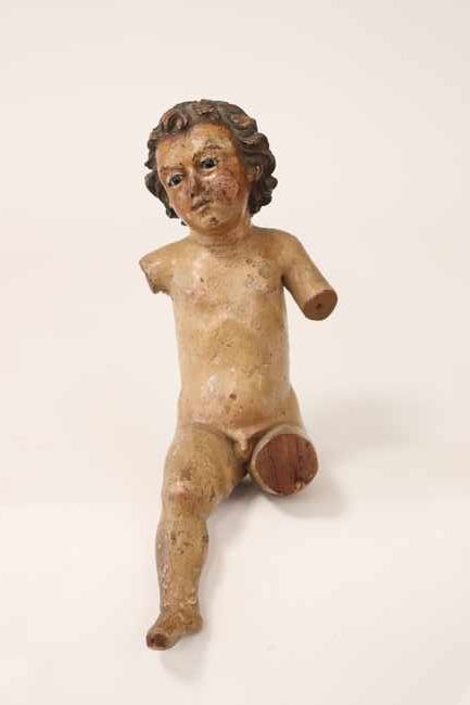 PUTTO en bois sculpté polychrome, la tête...