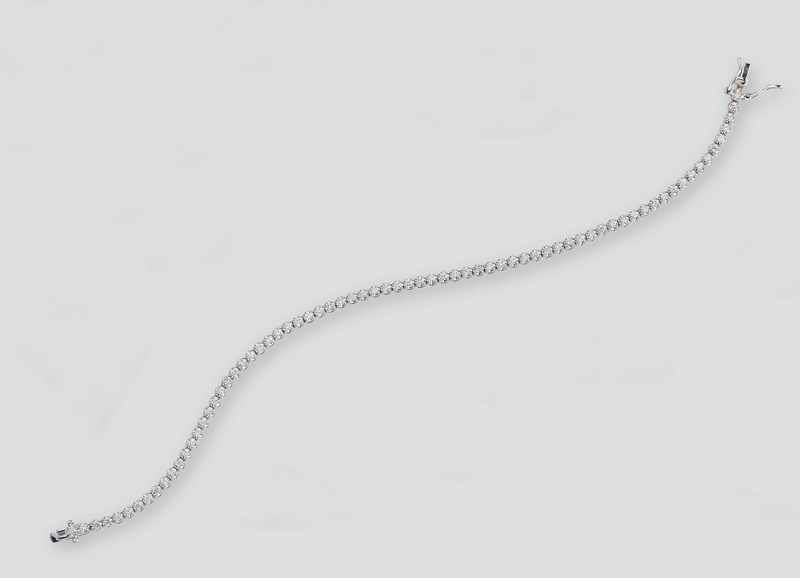 FIN BRACELET LIGNE en or gris (750) orné...