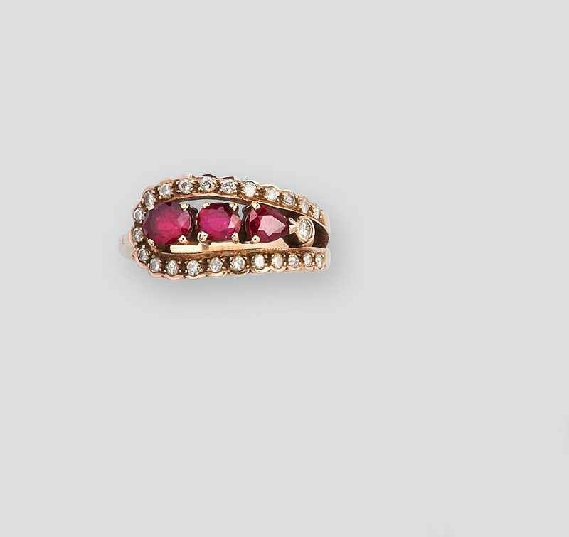 BAGUE en or (585) de forme boucle avec trois...