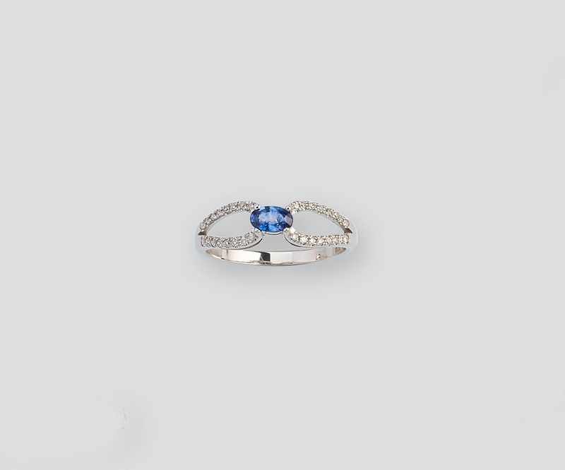 BAGUE en or gris (375) sertie d'un petit...
