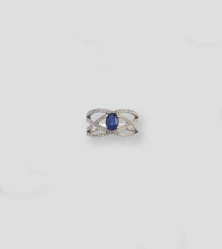 BAGUE en argent (925) sertie d'un saphir...