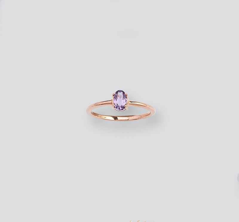 BAGUE en or rose (375) sertie d'une amethyste...