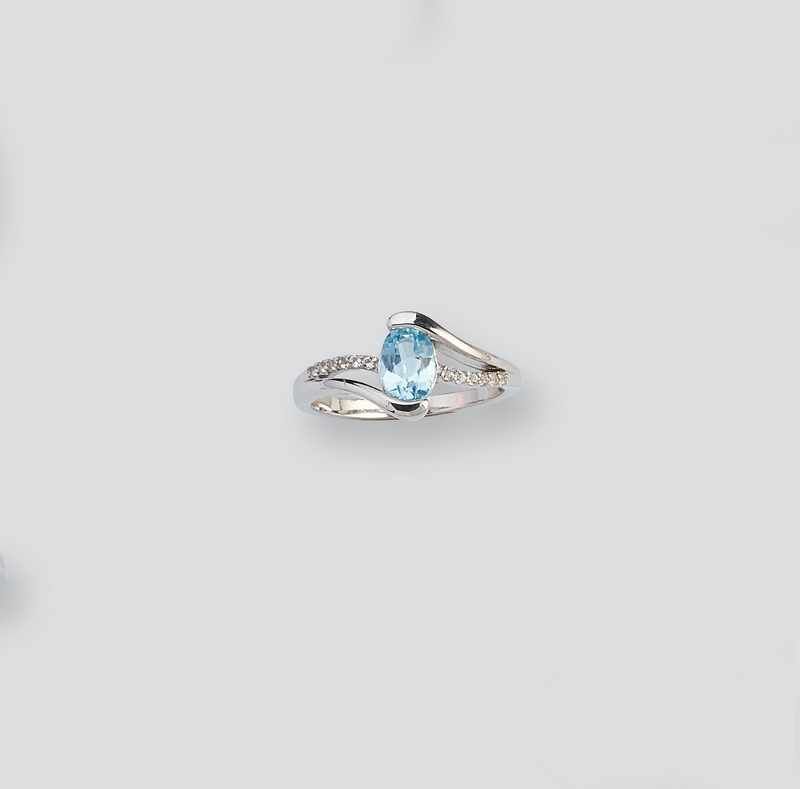 BAGUE en argent (925) sertie d'une topaze...