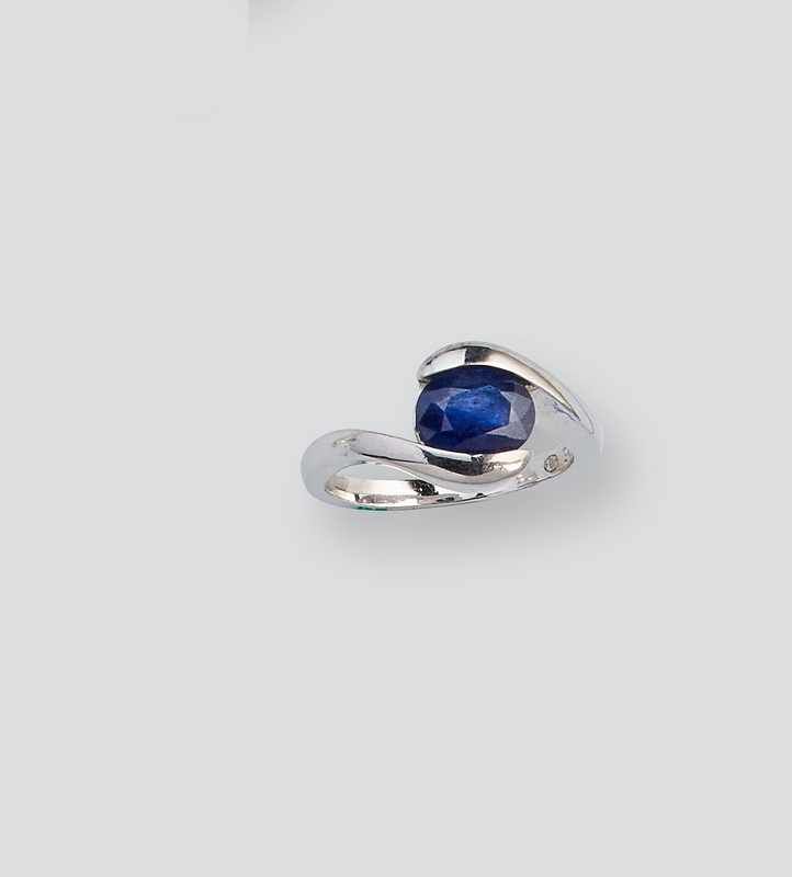 BAGUE en argent (925) à deux branches ouvertes...