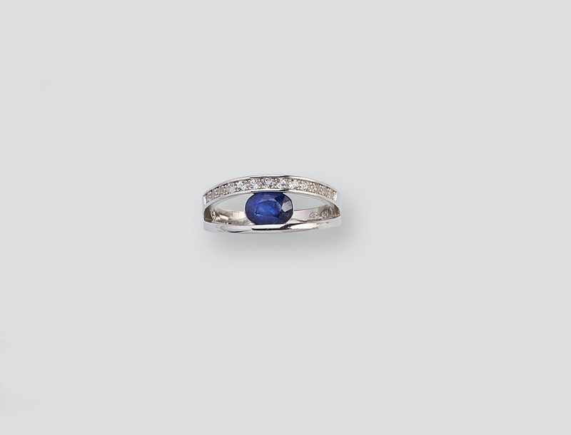 BAGUE en argent (925) à deux branches dont...