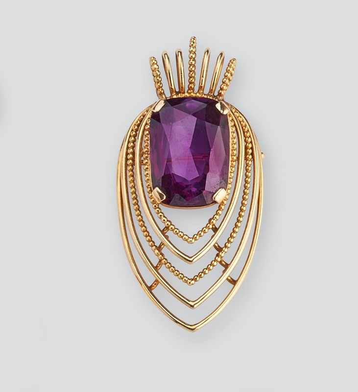 PENDENTIF / BROCHE de forme poire en or (750)...