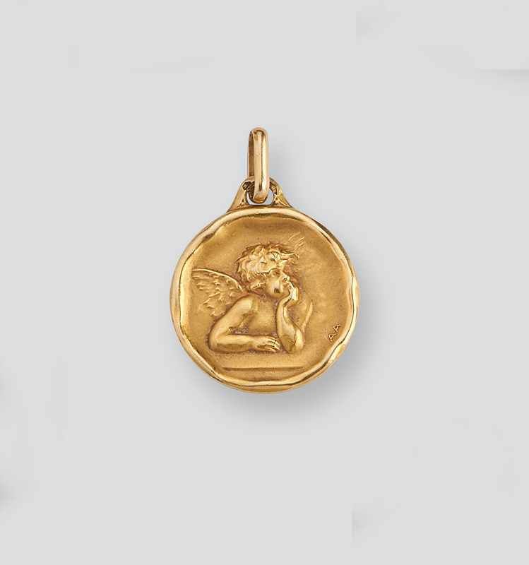 MEDAILLE en or (750). représentant un angelot...