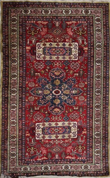 TAPIS en laine polychrome à huit registres...