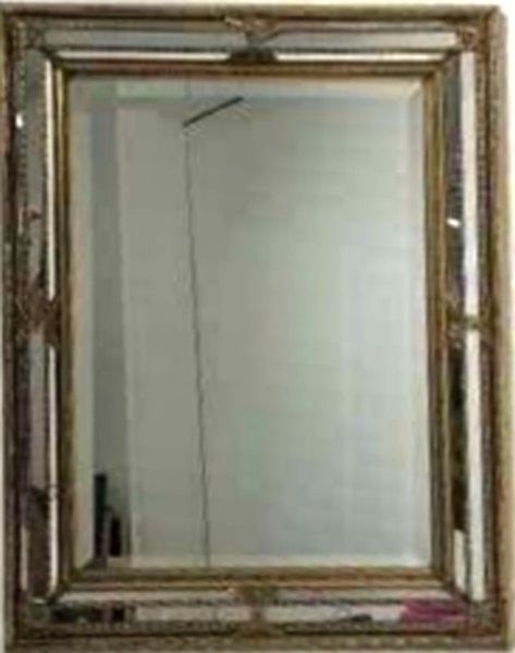 PETIT MIROIR rocaille en bois et stuc doré...