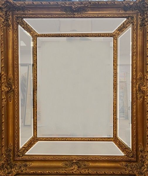 MIROIR retangulaire à parecloses biseautées...