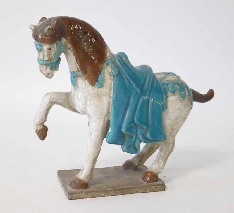 CHEVAL en terre cuite émaillée blanc et turquoise,...