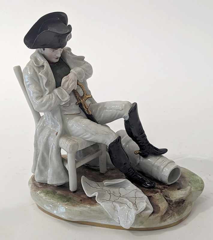 STATUETTE en porcelaine polychrome représentant...