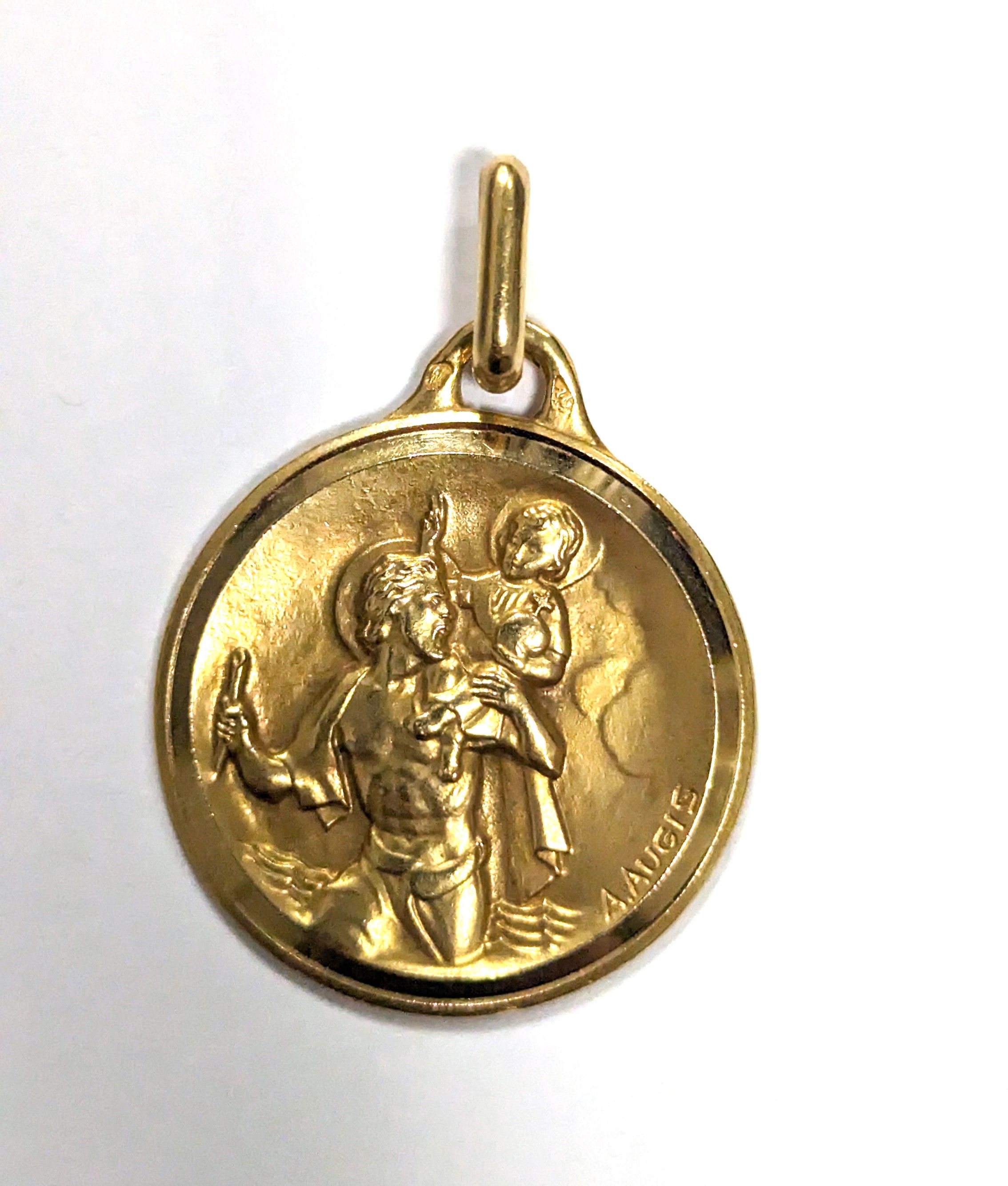 MÉDAILLE circulaire en or jaune (750) représentant...