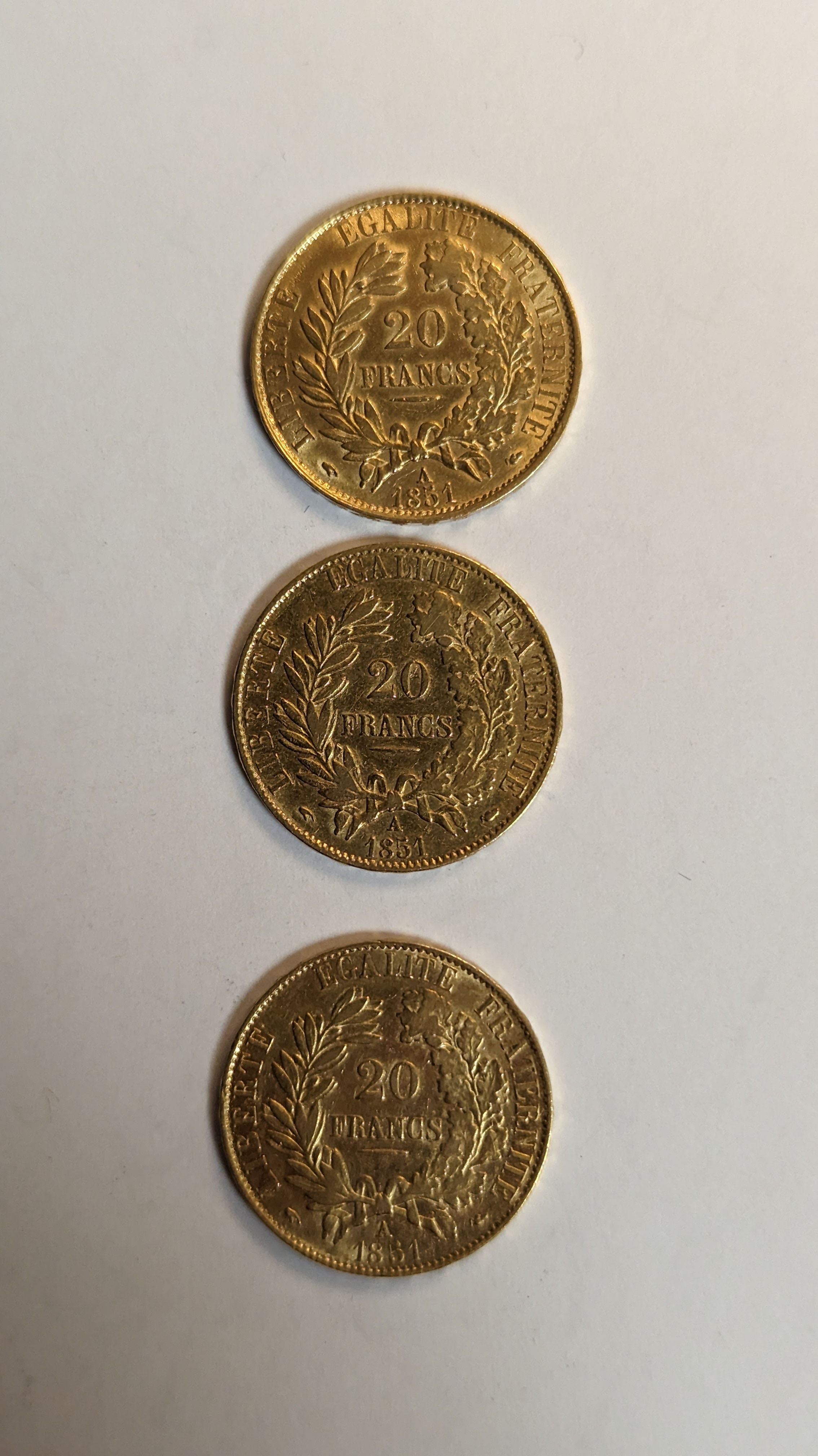 3 PIECES DE 20 FRANCS en or. Graveur Merley....
