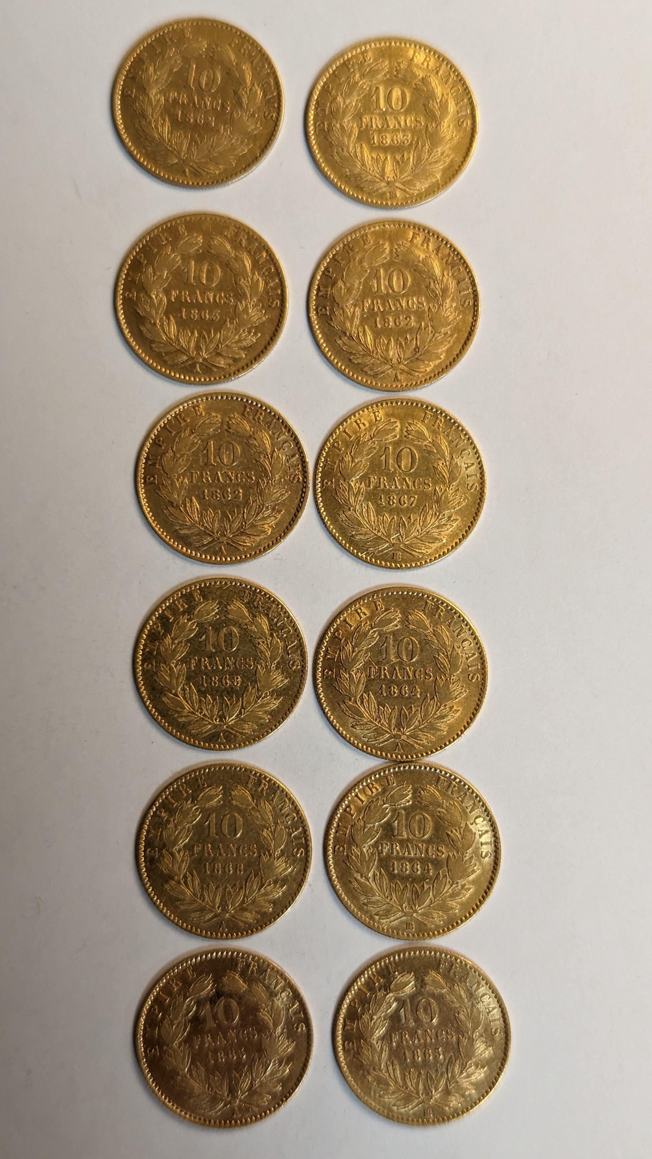 12 PIECES DE 10 FRANCS en or. Graveur Barre....