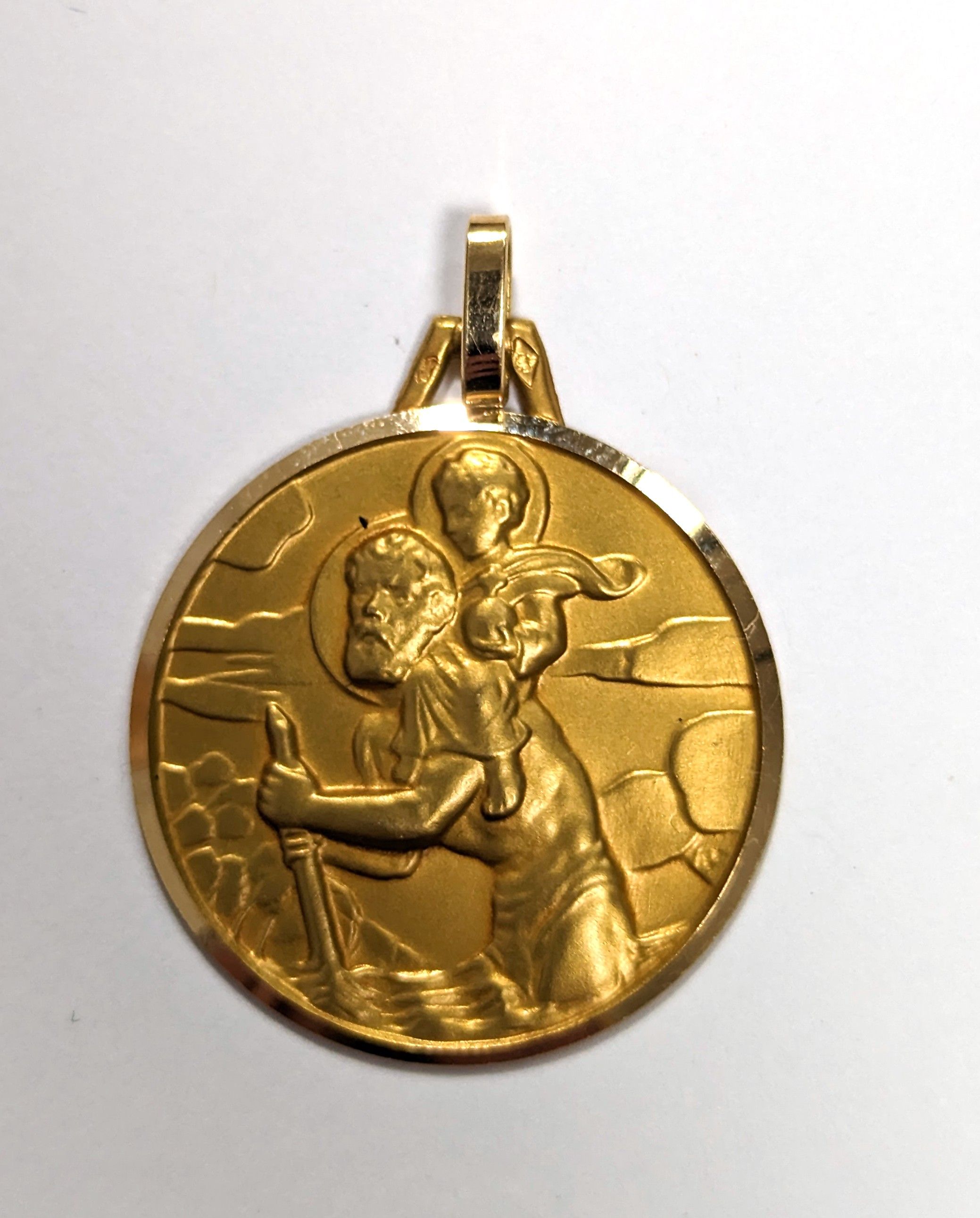 MÉDAILLE ronde en or jaune (750) représentant...