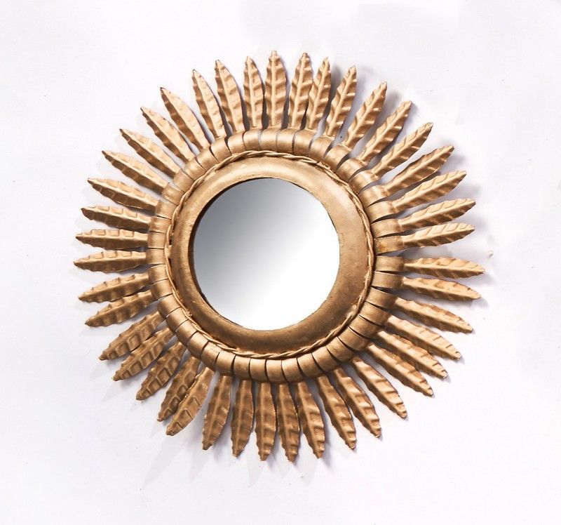 MIROIR SOLEIL rond dans un cadre en métal...