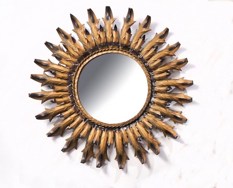 MIROIR SOLEIL rond dans un cadre en métal...
