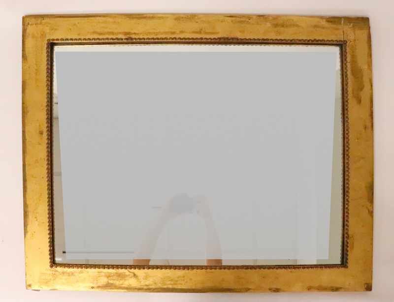 MIROIR rectangulaire en bois doré mouluré...
