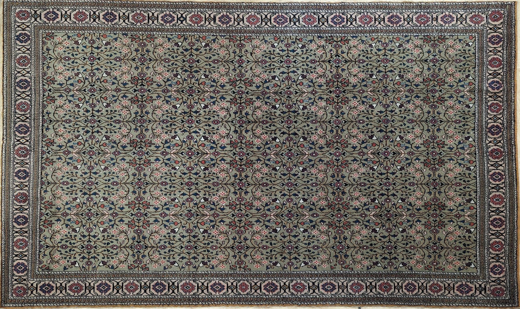 TAPIS en laine polychrome à deux registres...