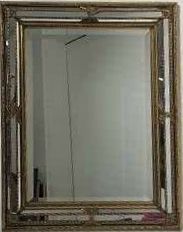 PETIT MIROIR rocaille en bois et stuc doré...