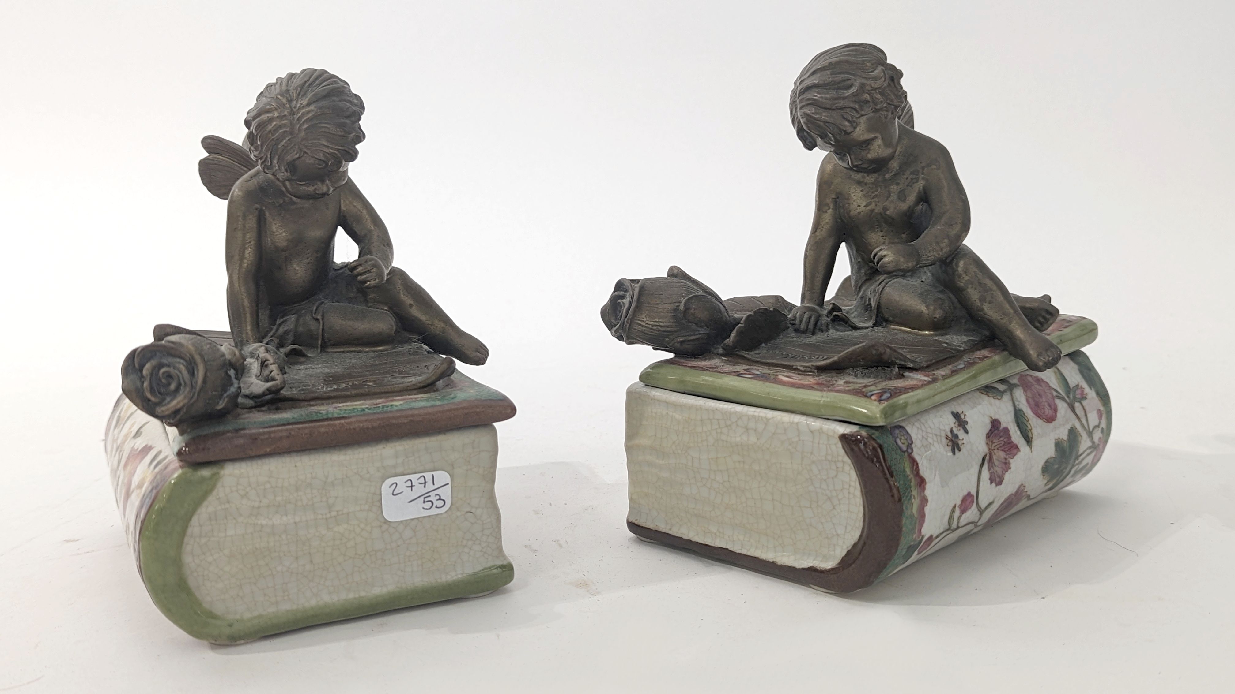 DEUX BOÎTES rectangulaires formant livre...